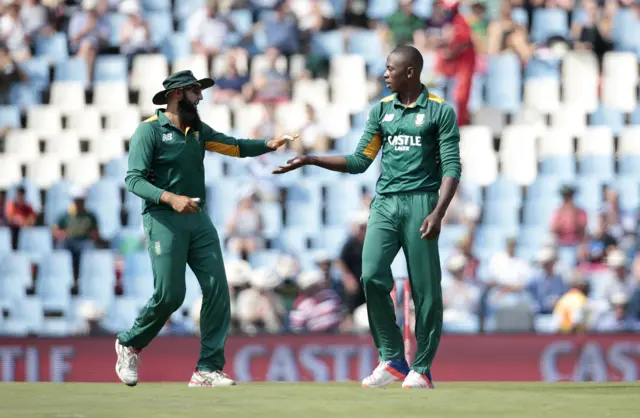 Hashim Amla celebrates with Kagiso Rabada