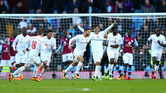 Liverpool celebrate Kolo Toure's goal at Villa