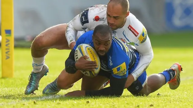 Sale winger Nev Edwards scores a try against Exeter