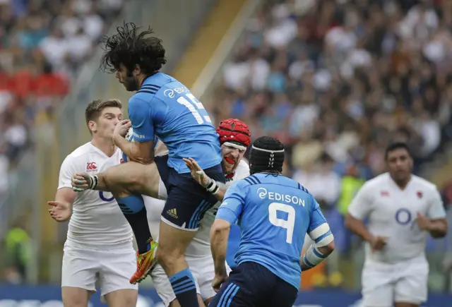 James Haskell tackles a player in the air