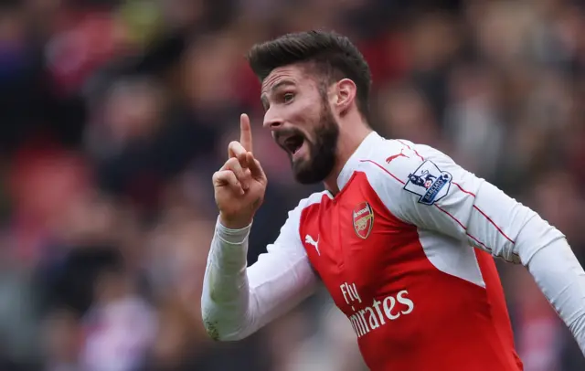 Olivier Giroud gestures to the referee