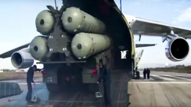 a Russian S-400 air defense missile systems being unloaded from an An-124 Ruslan cargo plane at the Hemeimeem air base in Syria, about 50km (30 miles) south of the border with Turkey - November 2015