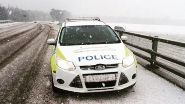 Police car on the A11