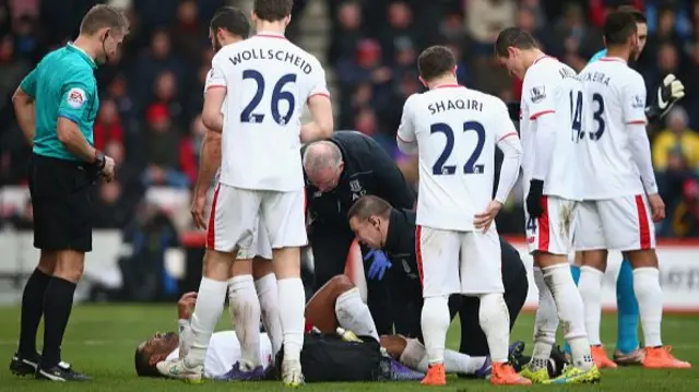 Glen Johnson of Stoke City receives a medical treatment during the Barclays Premier League match between A.F.C. Bournemouth and Stoke City