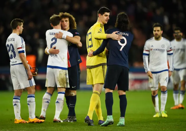 The players embrace at full-time