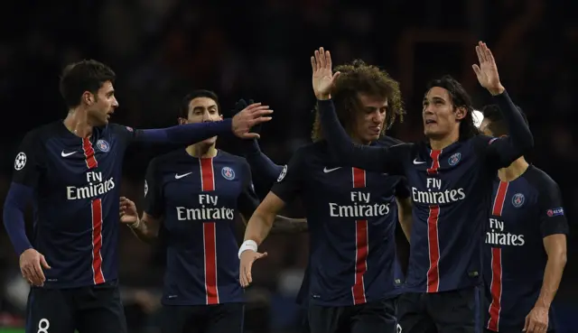 Edinson Cavani celebrates with his PSG team mates