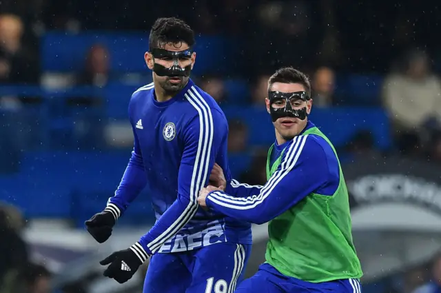 Chelsea men in masks