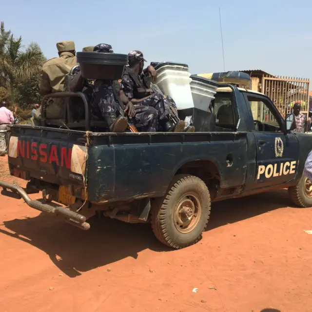 Police truck delivering material