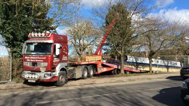 Narrow boat being removed from Botley