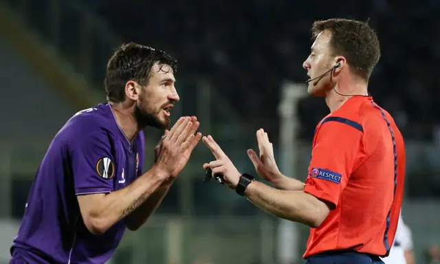 Nenad Tomovic talks with the referee