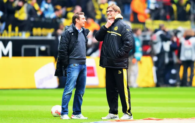 Jurgen Klopp chats to Augsburg boss Markus Weinzierl