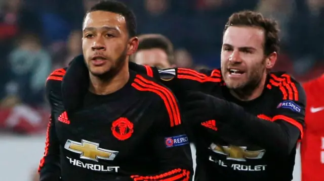 Memphis Depay and Juan Mata celebrate