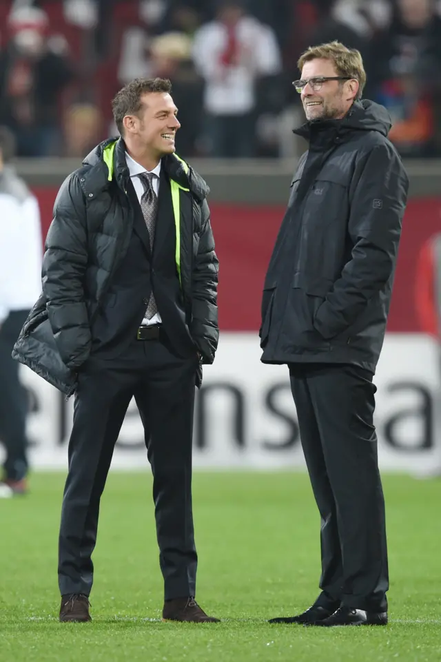 Jurgen Klopp, manager of Liverpool and Markus Weinzierl head coach of Augsburg