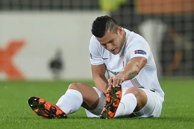 Raul Bobadilla of Augsburg picks up an injury