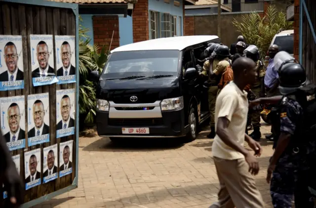 Police van taking Mr Besigye away