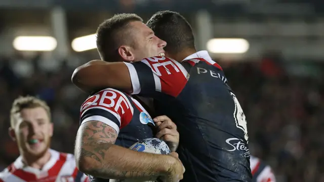 Sydney Roosters celebrate a try