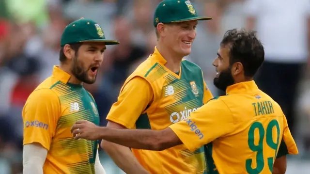 Imran Tahir celebrates with his team mates