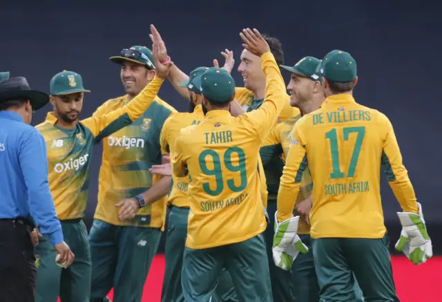 South Africa's players celebrate the wicket of Chris Jordan