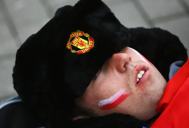 Man United fan sleeping