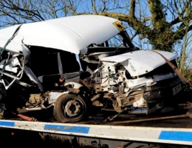 The wrecked minibus after the crash in Long Lane, Longford