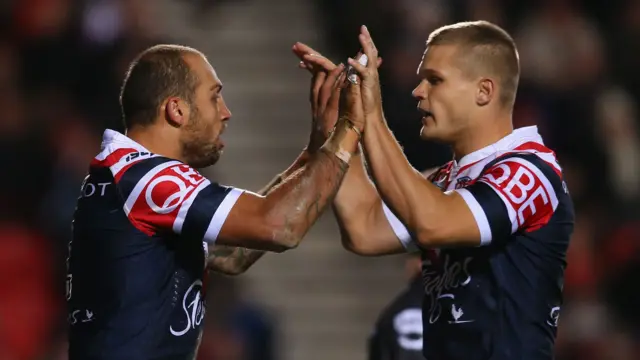 Sydney Roosters celebrate a try