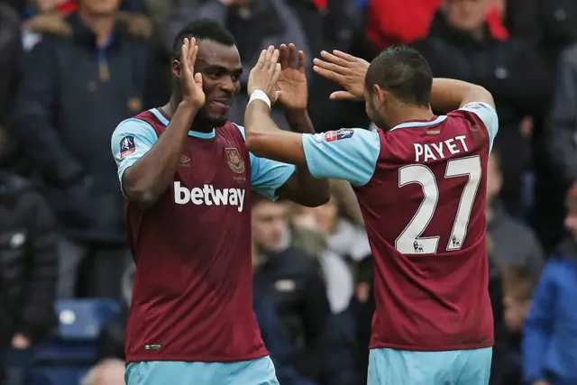 Emmanuel Emenike and Dimitri Payet