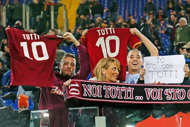 Roma supporters cheer for Francesco Totti