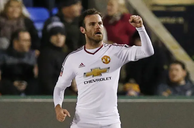 Juan Mata celebrates