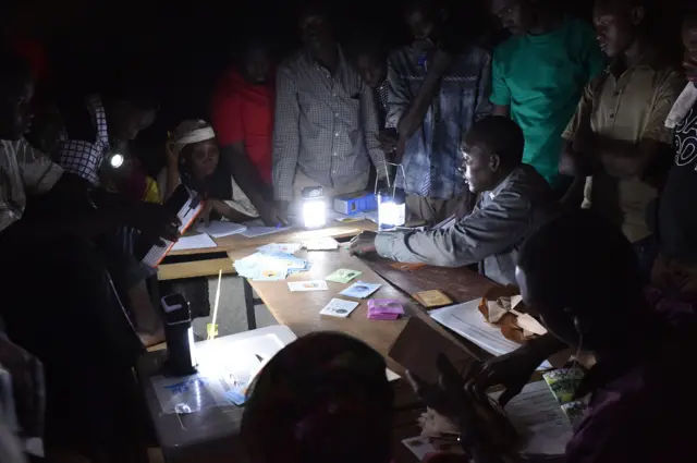 Election officials were counting votes by torchlight on 21 February 2016