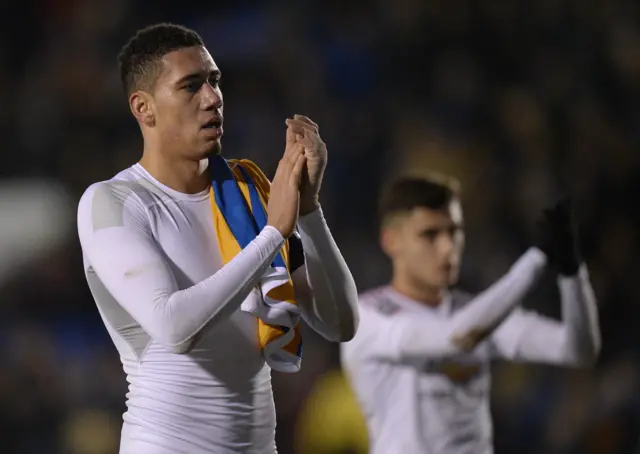 Chris Smalling applaud the Manchester United fans