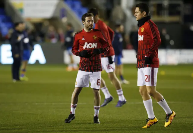 Ander Herrera and Juan Mata warm up