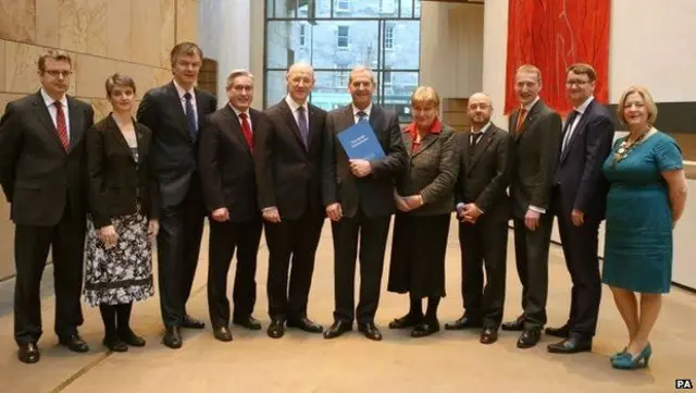 John Swinney with his colleagues and Lord Smith holding the Smith Commission