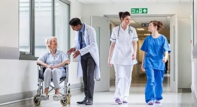 Nurse and surgeon with patients