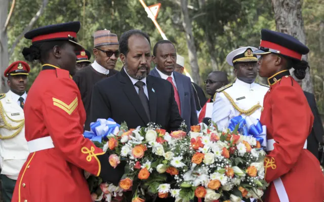 Somalia's President Hassan Sheikh Mohamud with a wreath