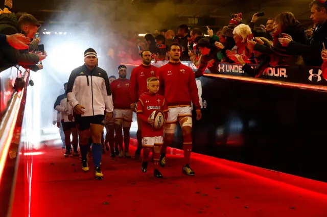 Wales and France enter the pitch