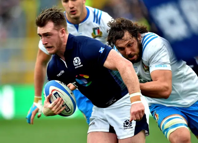 Scotland's Stuart Hogg tries to break