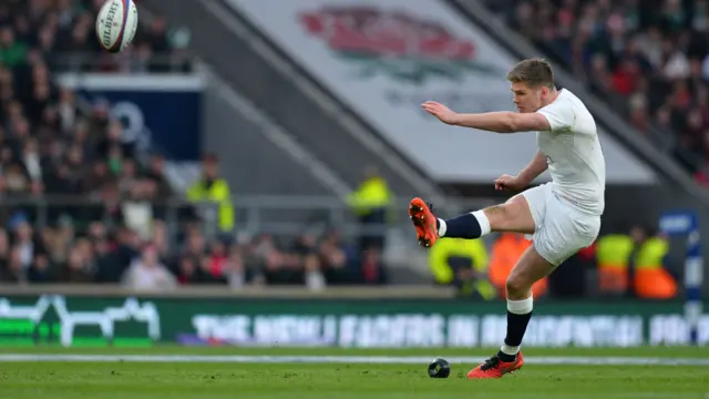 Owen Farrell kicks