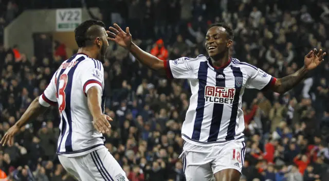 Saido Berahino of West Brom celebrates with Salomon Rondon