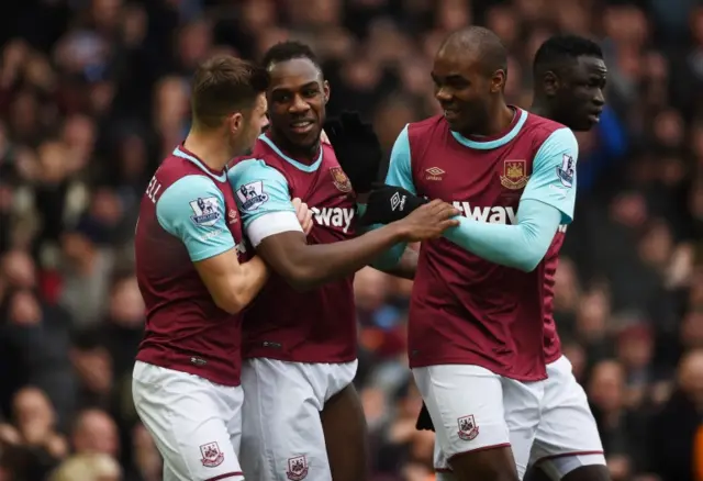 West Ham players celebrate with Michail Antonio