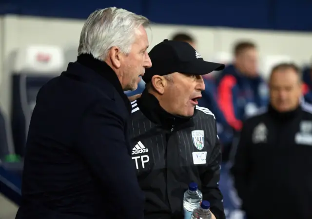 Palace manager Alan Pardew greets opposite number Tony Pulis