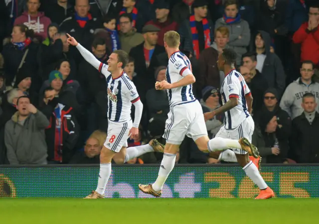 Craig Gardner celebrates