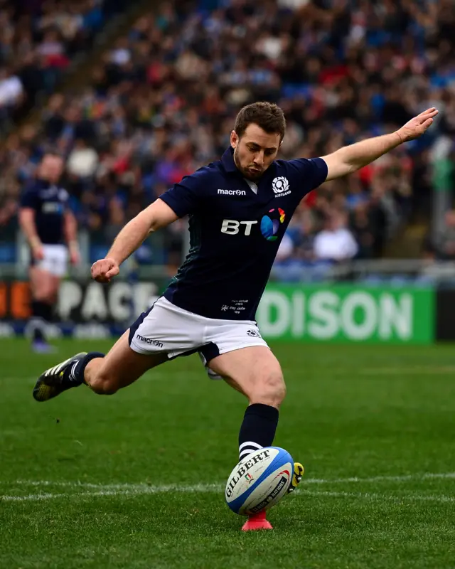 Greig Laidlaw kicks a penalty for Scotland