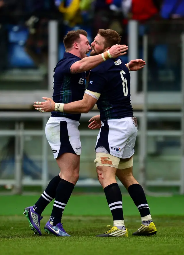 John Barclay and Stuart Hogg celebrate