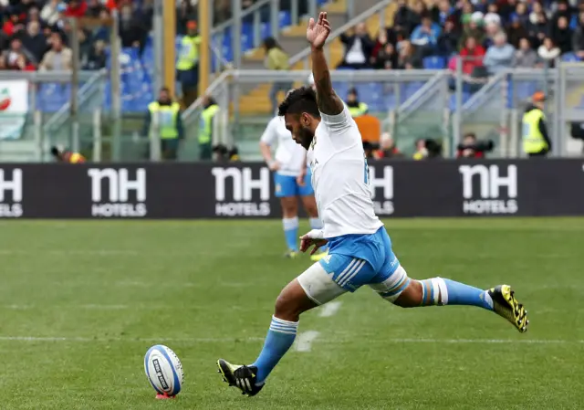 Kelly Haimona kicks a penalty for Italy