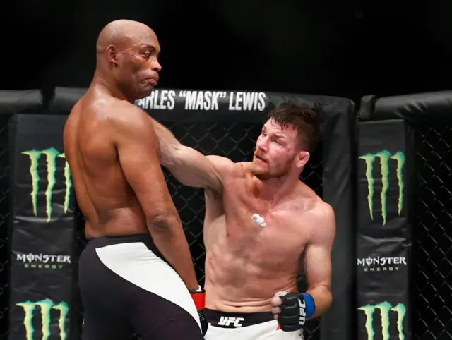Michael Bisping hits Anderson Silva