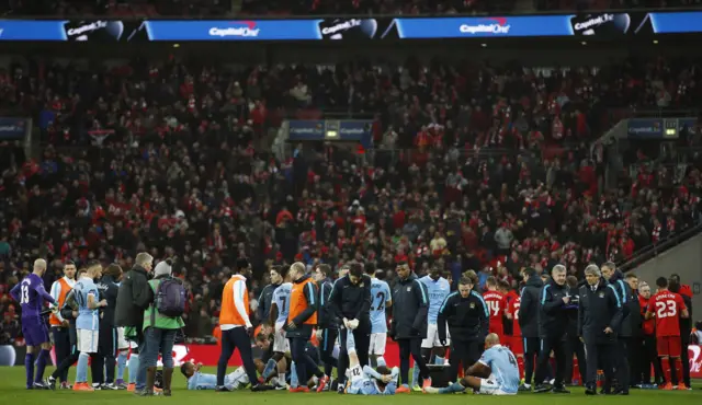 Both teams on the pitch at full-time