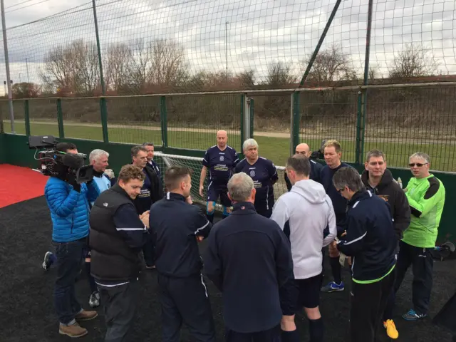 Beechcroft Walking Football Club having a very serious team talk ahead of the kick off for the walking football in Nottingham.