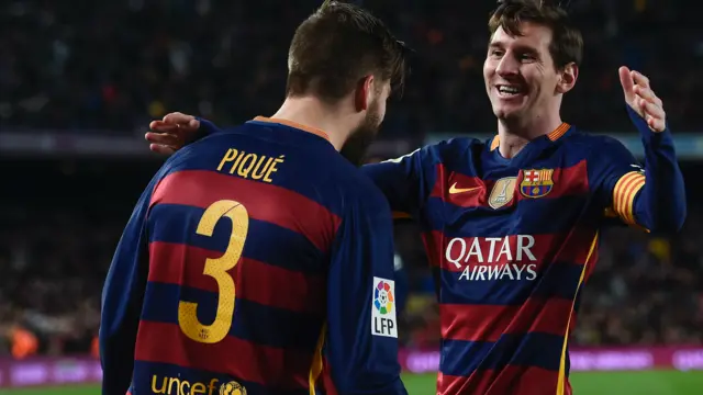 Lionel Messi and Gerard Pique