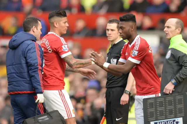 Timothy Fosu-Mensah comes on the field for the injured Marcos Rojo