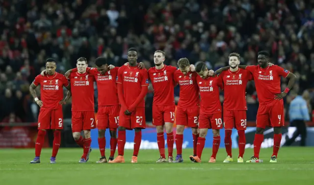 Liverpool players watch on